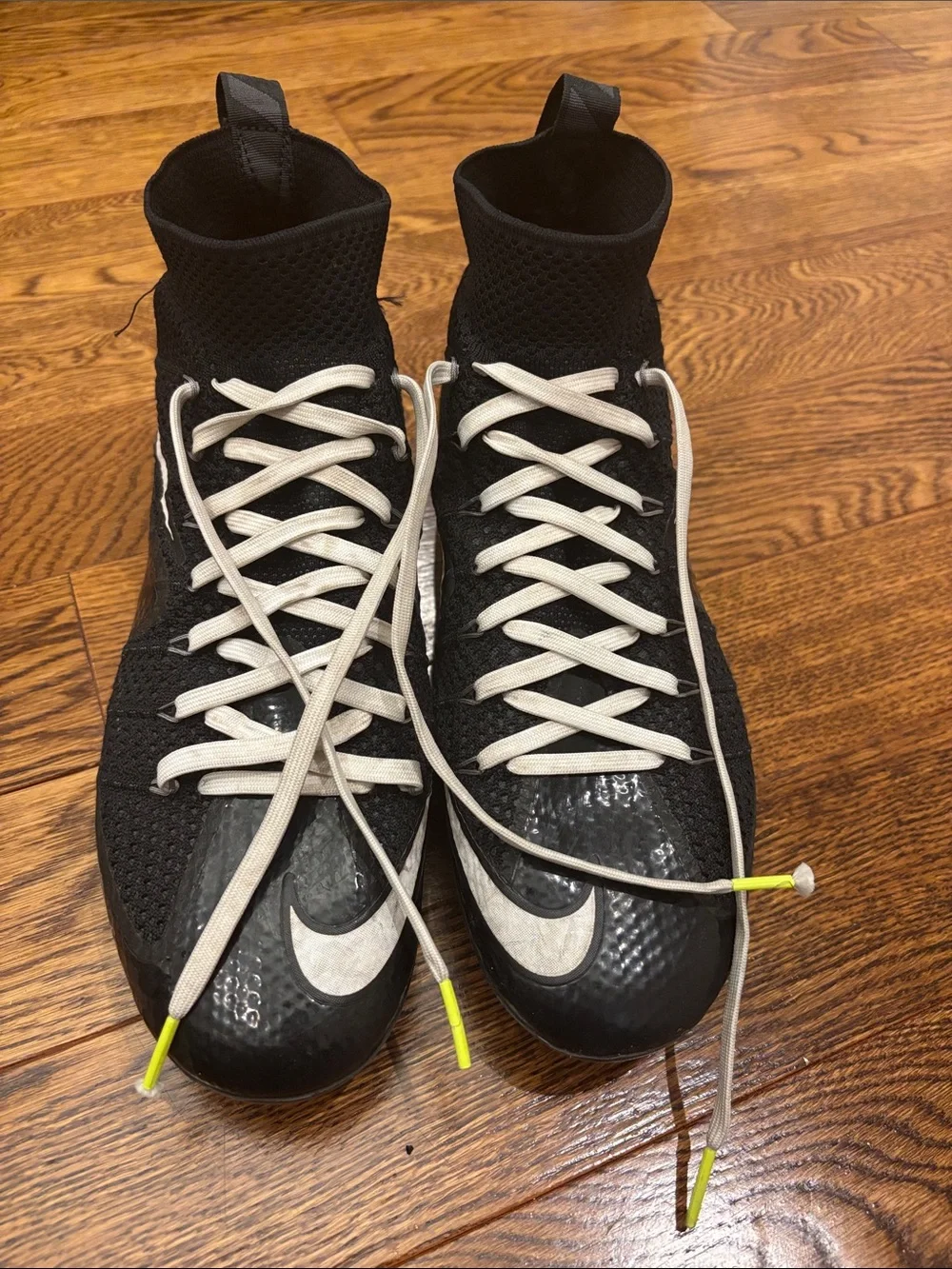 Nike Men’s Black Athletic Cleats with White Swoosh